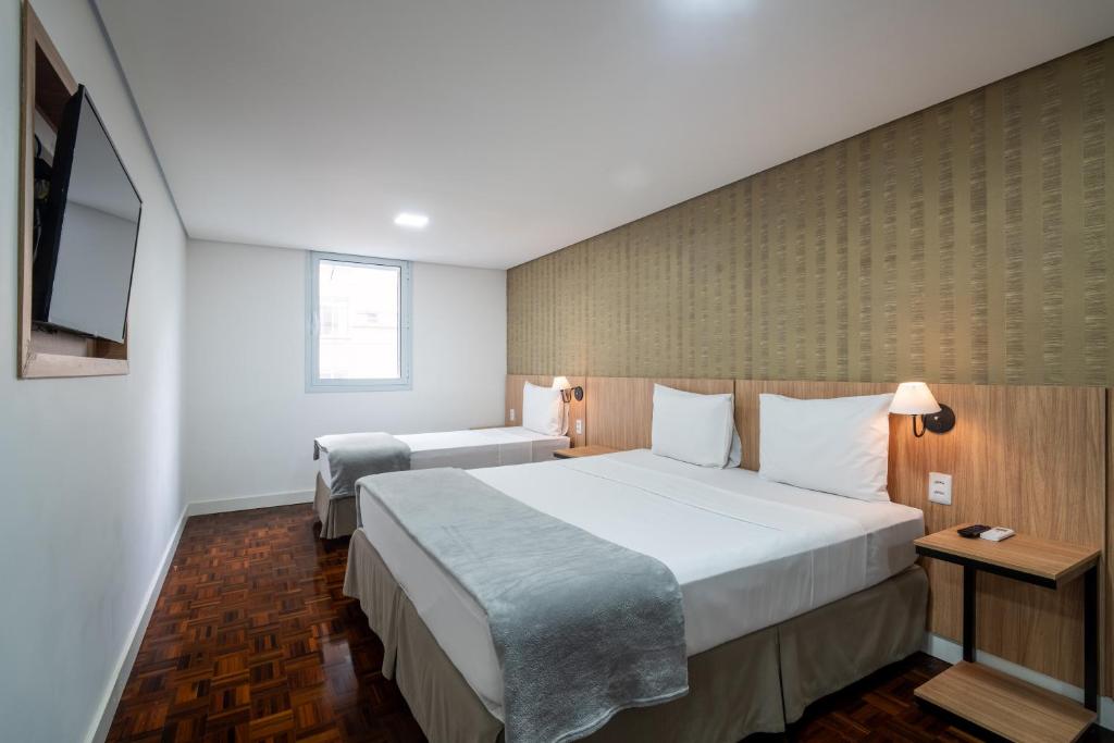 Postel nebo postele na pokoji v ubytování 155 Hotel
