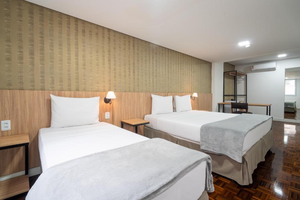 Postel nebo postele na pokoji v ubytování 155 Hotel