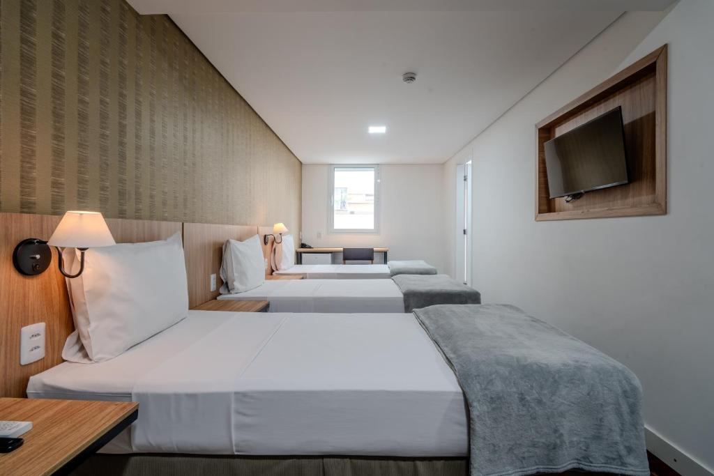 Postel nebo postele na pokoji v ubytování 155 Hotel