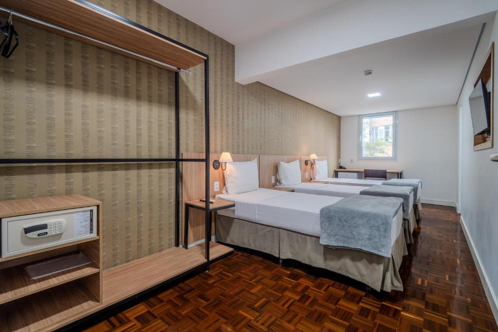 Postel nebo postele na pokoji v ubytování 155 Hotel