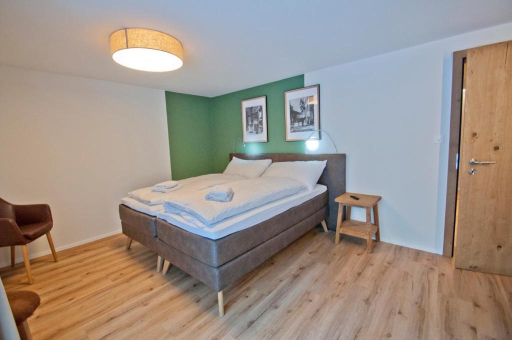 Postel nebo postele na pokoji v ubytování Chalet Aeschhorn