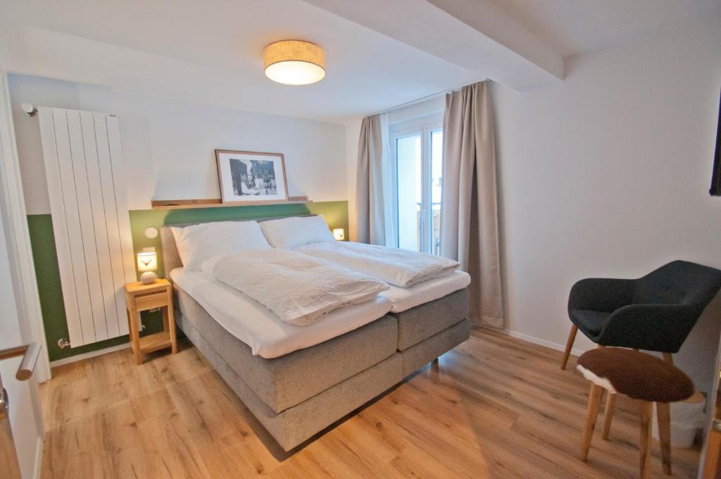 Postel nebo postele na pokoji v ubytování Chalet Aeschhorn