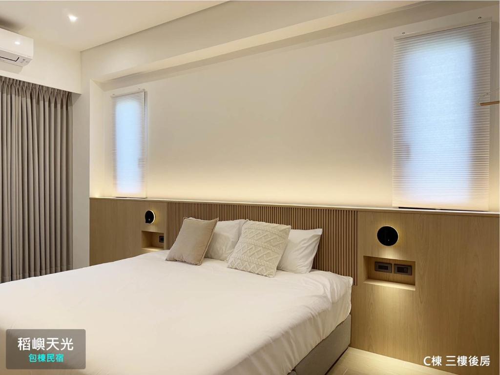 Letto o letti in una camera di 稻嶼天光包棟民宿