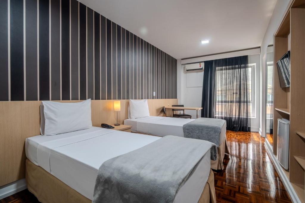 Postel nebo postele na pokoji v ubytování 155 Hotel