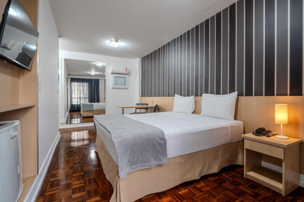 Postel nebo postele na pokoji v ubytování 155 Hotel