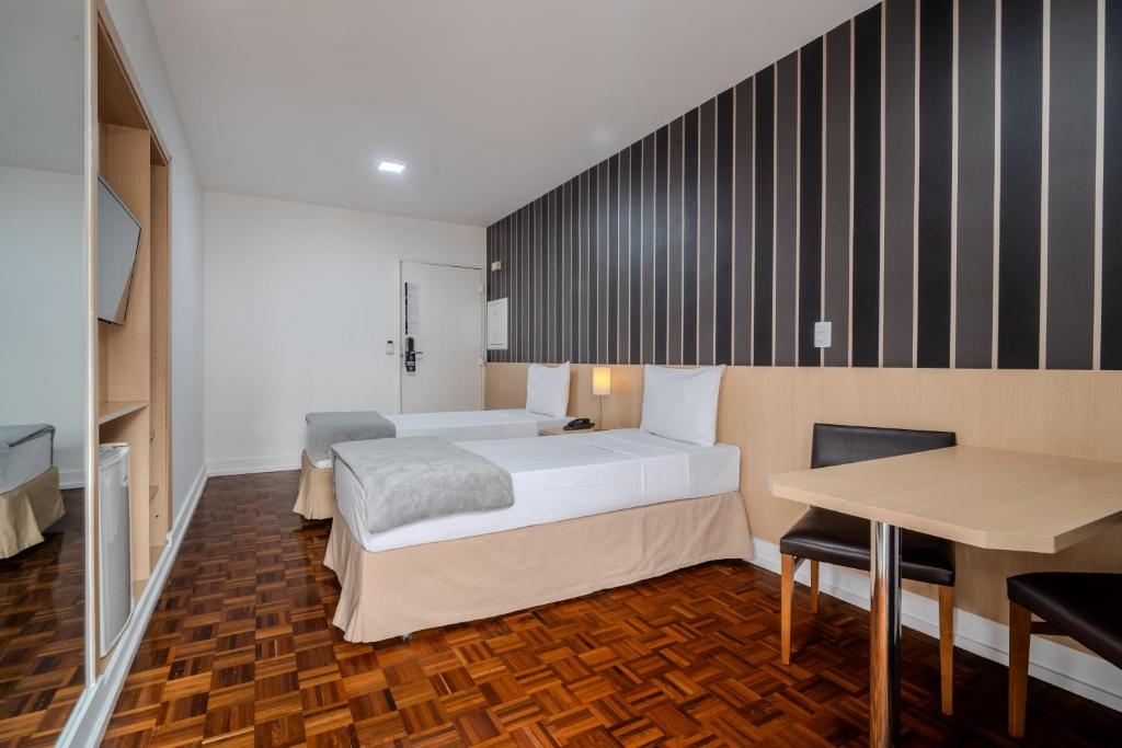Postel nebo postele na pokoji v ubytování 155 Hotel