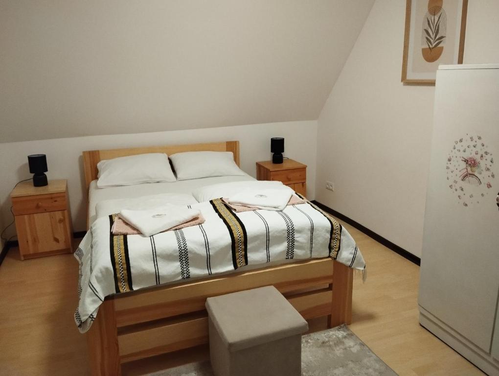 Postel nebo postele na pokoji v ubytování Ubytovani u Nadii