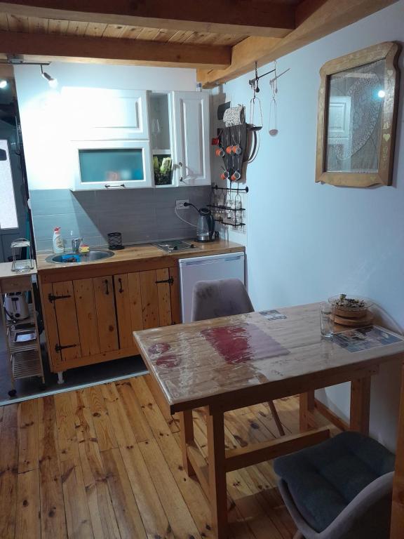 Kuchyň nebo kuchyňský kout v ubytování Apartman Čivović