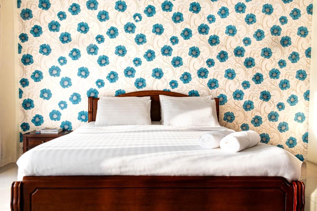 Postel nebo postele na pokoji v ubytování Alisa Krabi Hotel-SHA Plus