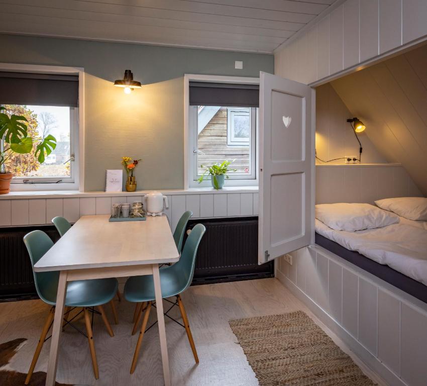 Postel nebo postele na pokoji v ubytování Hotel Marenland Winsum
