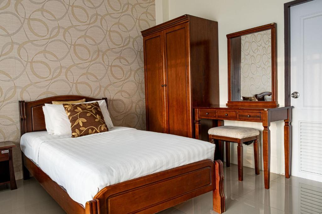 Postel nebo postele na pokoji v ubytování Alisa Krabi Hotel-SHA Plus