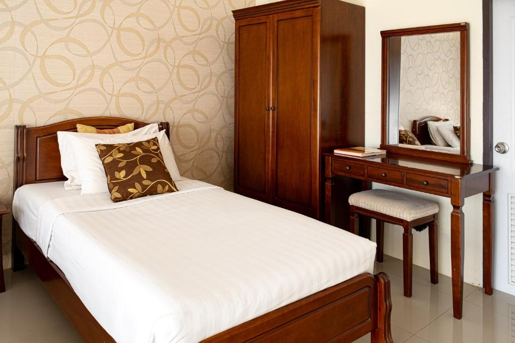 Postel nebo postele na pokoji v ubytování Alisa Krabi Hotel-SHA Plus