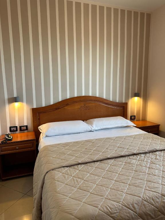 Ένα ή περισσότερα κρεβάτια σε δωμάτιο στο Hotel Futuro