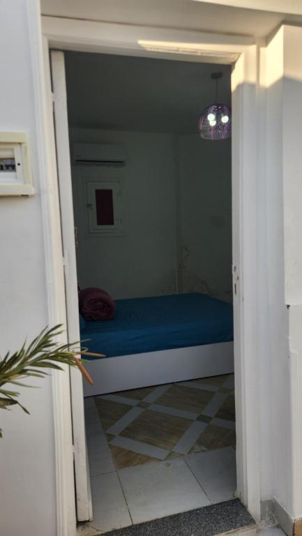 Postel nebo postele na pokoji v ubytování White Roof - Hurghada
