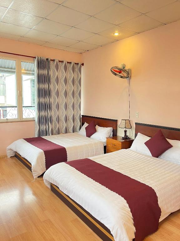 Ліжко або ліжка в номері New Sleep in Dalat Hostel