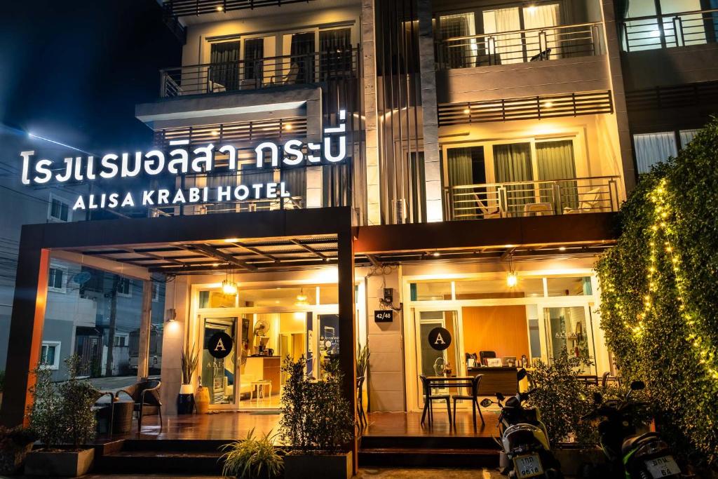 a building with a sign that reads is juliana kashaishi hotel at Alisa Krabi Hotel-SHA Plus in Krabi