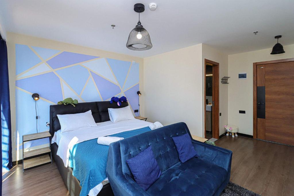 Postel nebo postele na pokoji v ubytování Stylish Studio Apartment with balcony