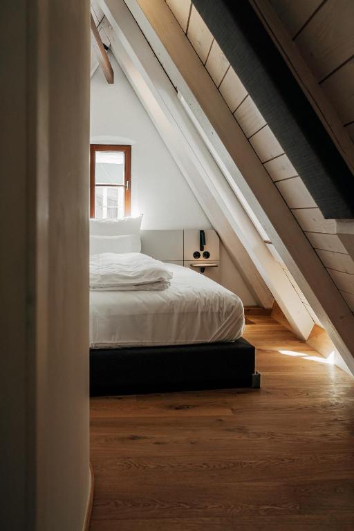 Postel nebo postele na pokoji v ubytování Bootshaus Amberg
