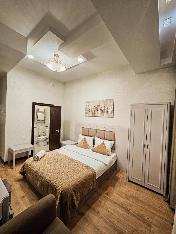 Postel nebo postele na pokoji v ubytování Safran Hotel
