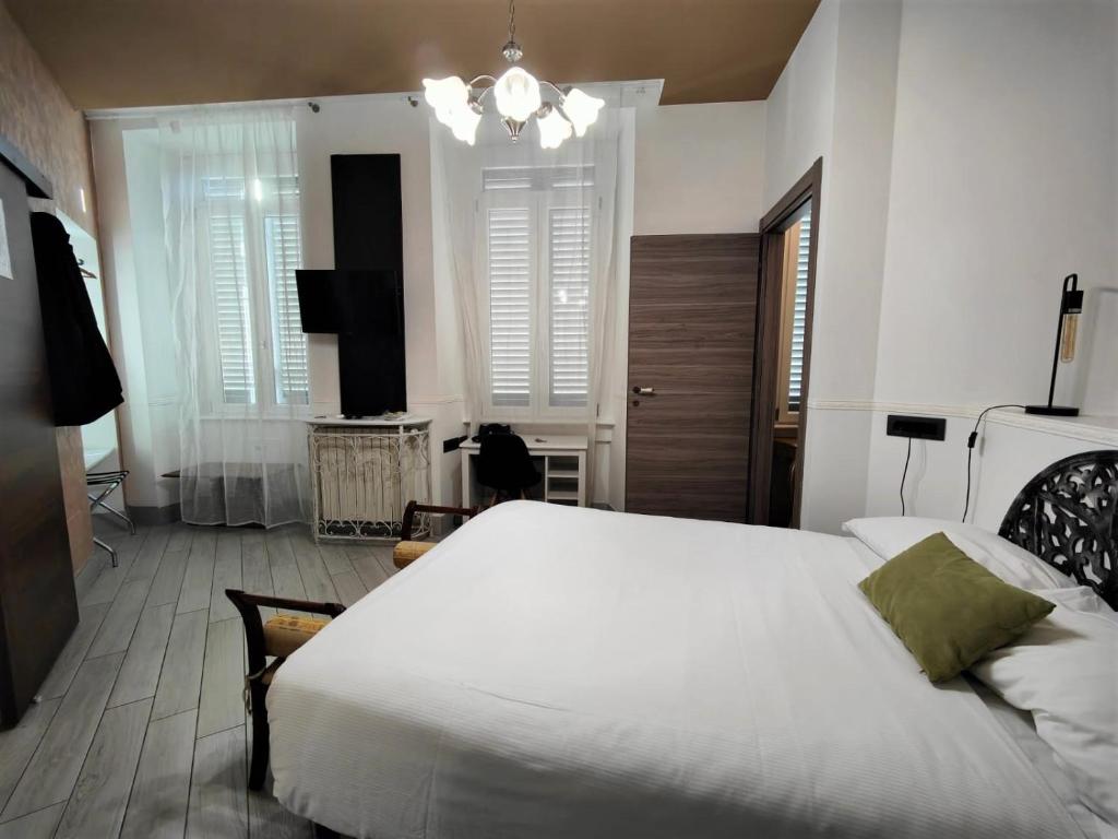 Postel nebo postele na pokoji v ubytování Aparthotel Dei Mercanti