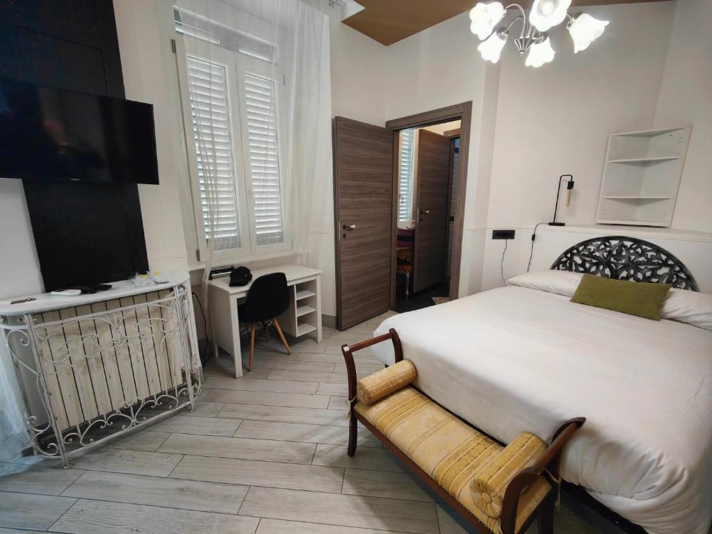 Postel nebo postele na pokoji v ubytování Aparthotel Dei Mercanti