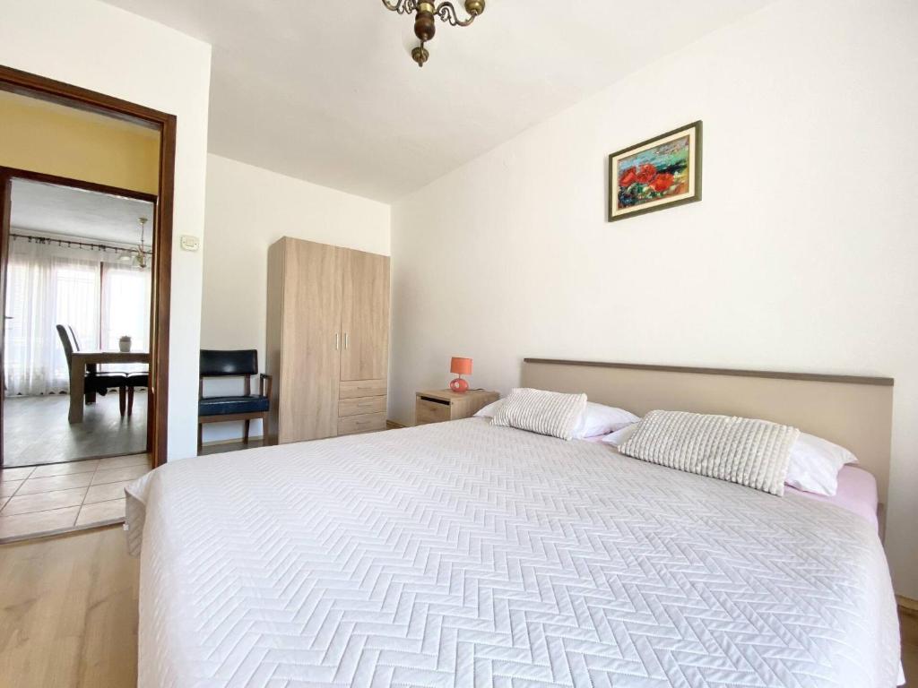 Posteľ alebo postele v izbe v ubytovaní Apartment Almira with sea view