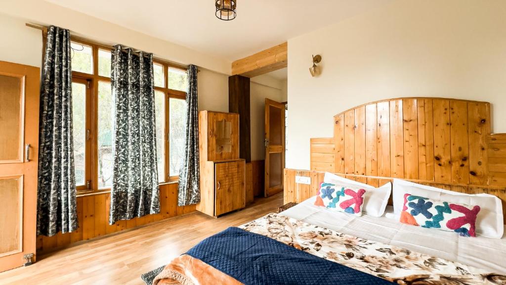 Postel nebo postele na pokoji v ubytování Bayith Cafe and Stay