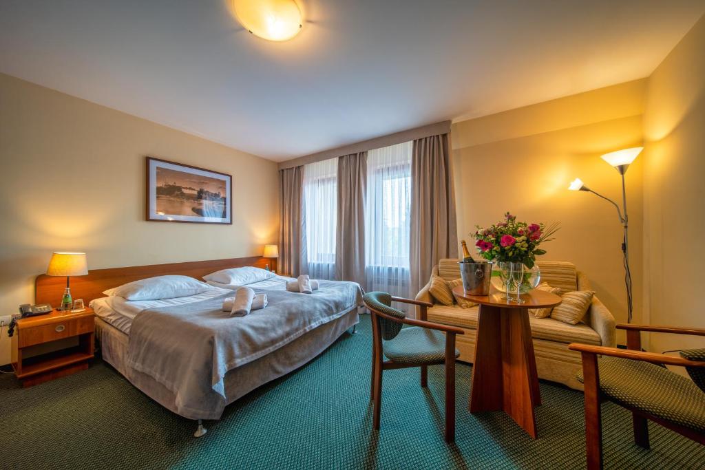 Posteľ alebo postele v izbe v ubytovaní Hotel City SM Business & Spa