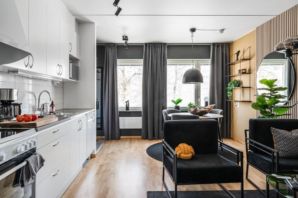 Kuchyň nebo kuchyňský kout v ubytování Guestly Homes - Elite Business Suite