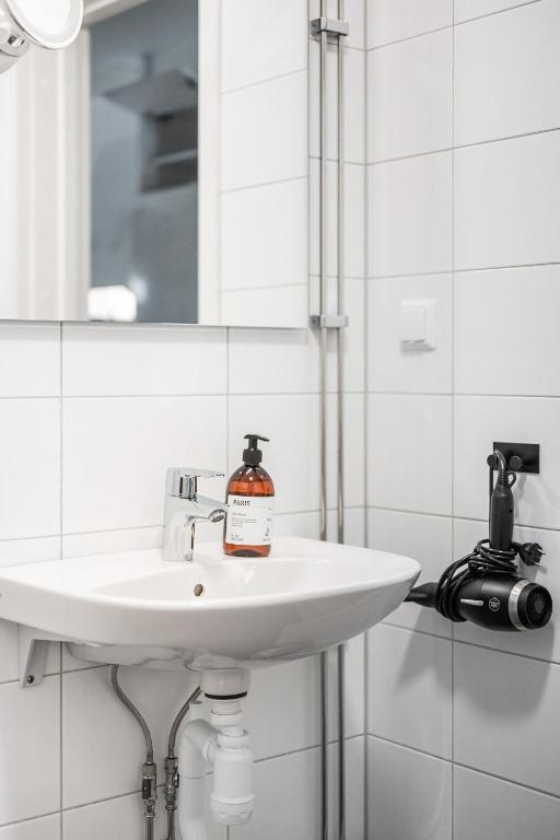 Koupelna v ubytování Guestly Homes - Elite Business Suite