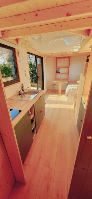Postel nebo postele na pokoji v ubytování Tiny house