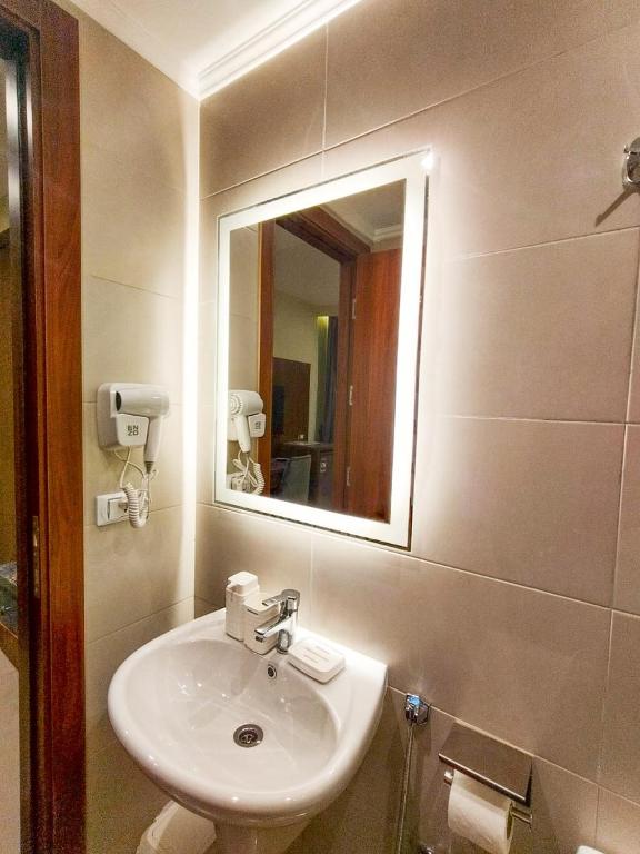 Koupelna v ubytování Sama hotel