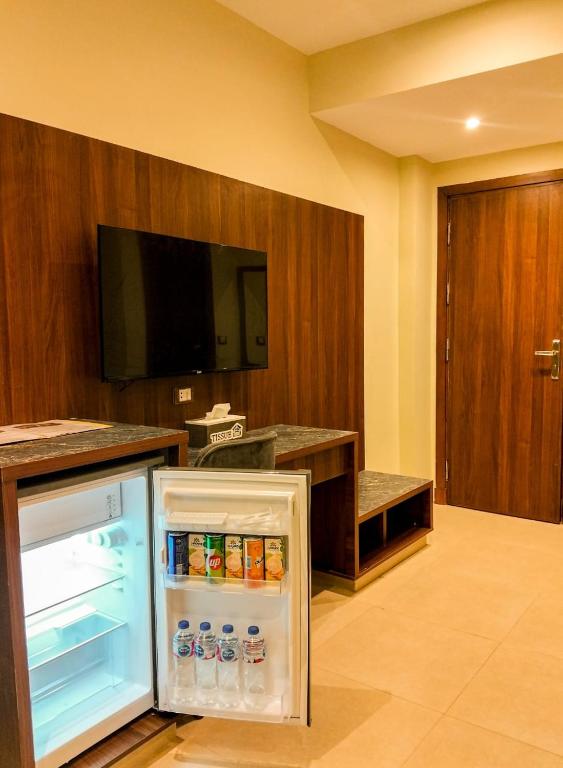 Kuchyň nebo kuchyňský kout v ubytování Sama hotel