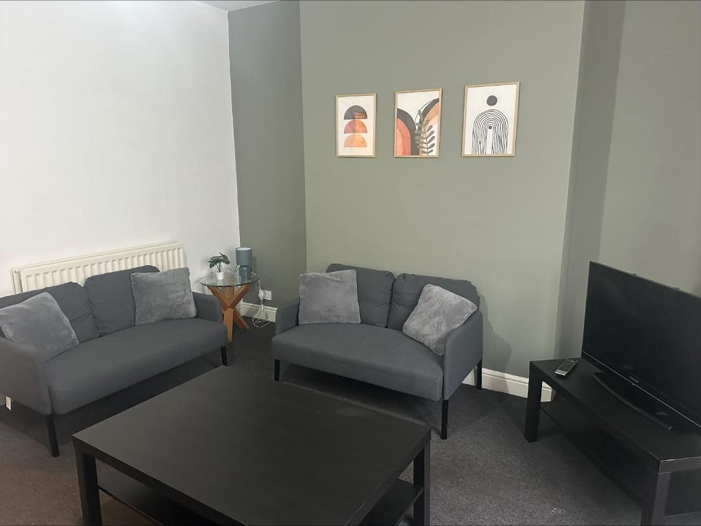 Χώρος καθιστικού στο Milton Road Flat 1 - TSAC