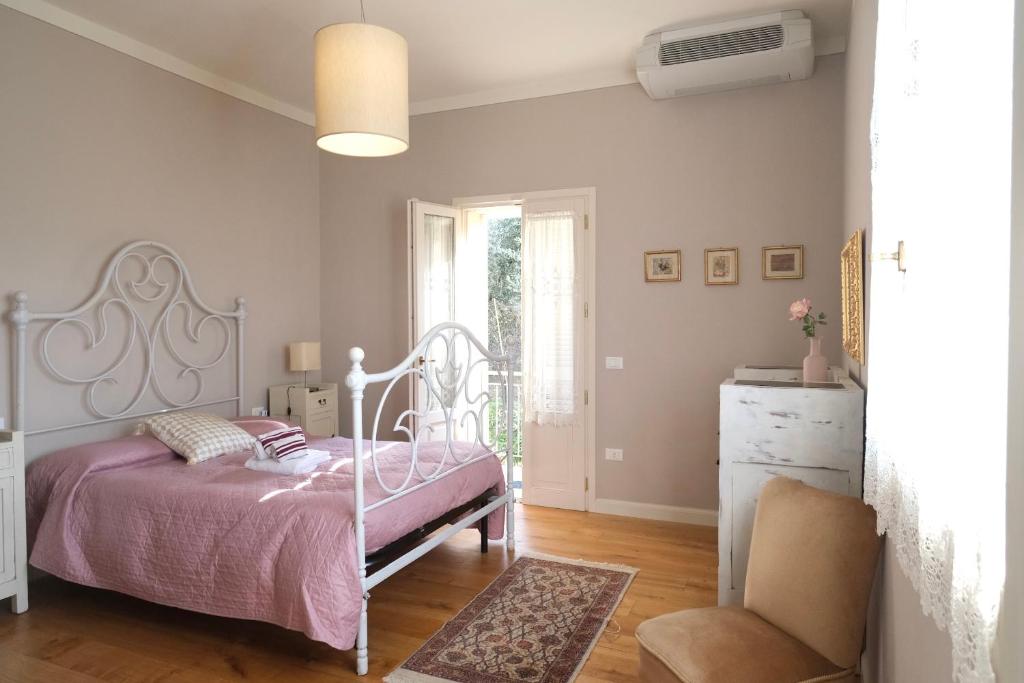 Posteľ alebo postele v izbe v ubytovaní B&B Orsobigio