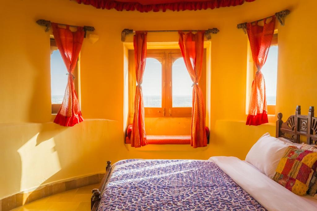 Postel nebo postele na pokoji v ubytování Sagar Guest House