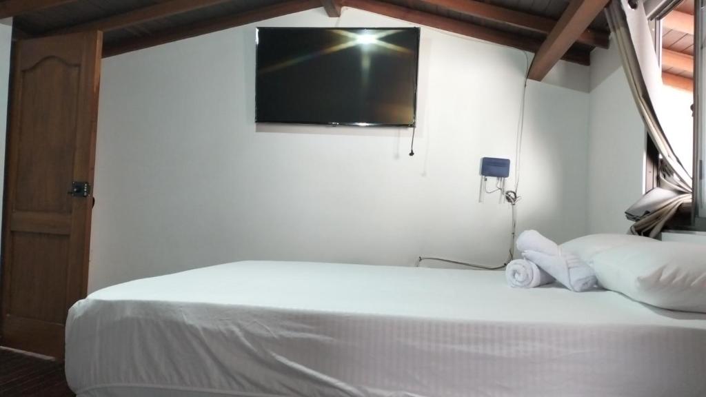 Postel nebo postele na pokoji v ubytování Vivienda turística Doña Barbara