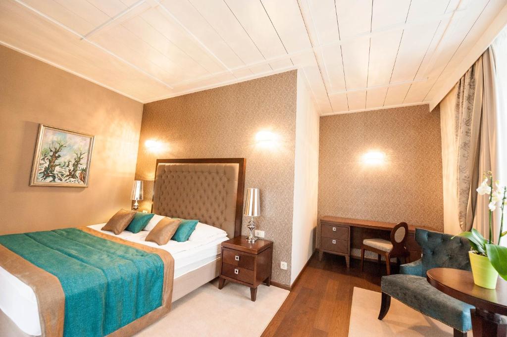 Voodi või voodid majutusasutuse Hotel Zagreb - Health & Beauty toas