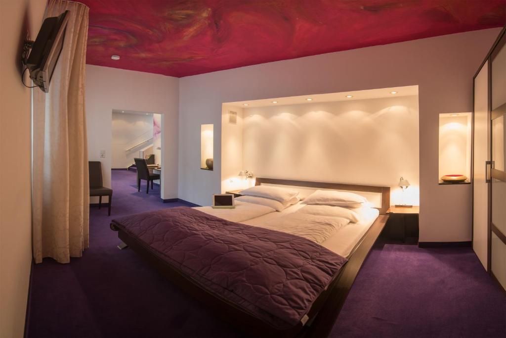 Postel nebo postele na pokoji v ubytování Hotel Etol - Superior