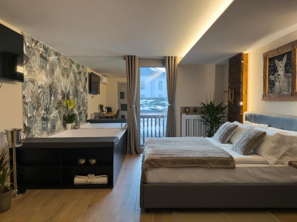 Postel nebo postele na pokoji v ubytování Il Cervo Chambres d'hôtes
