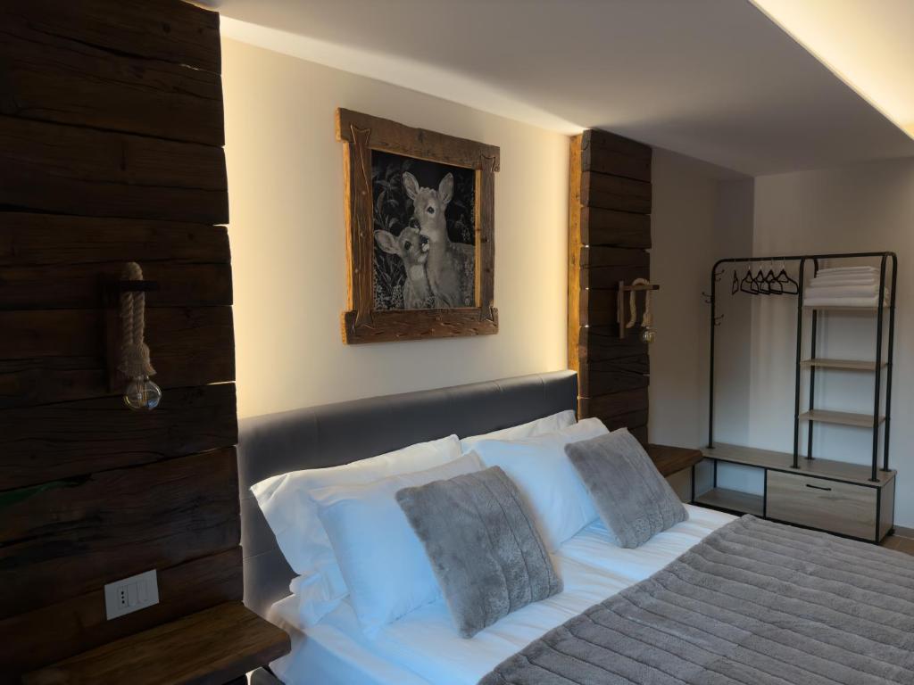 Postel nebo postele na pokoji v ubytování Il Cervo Chambres d'hôtes