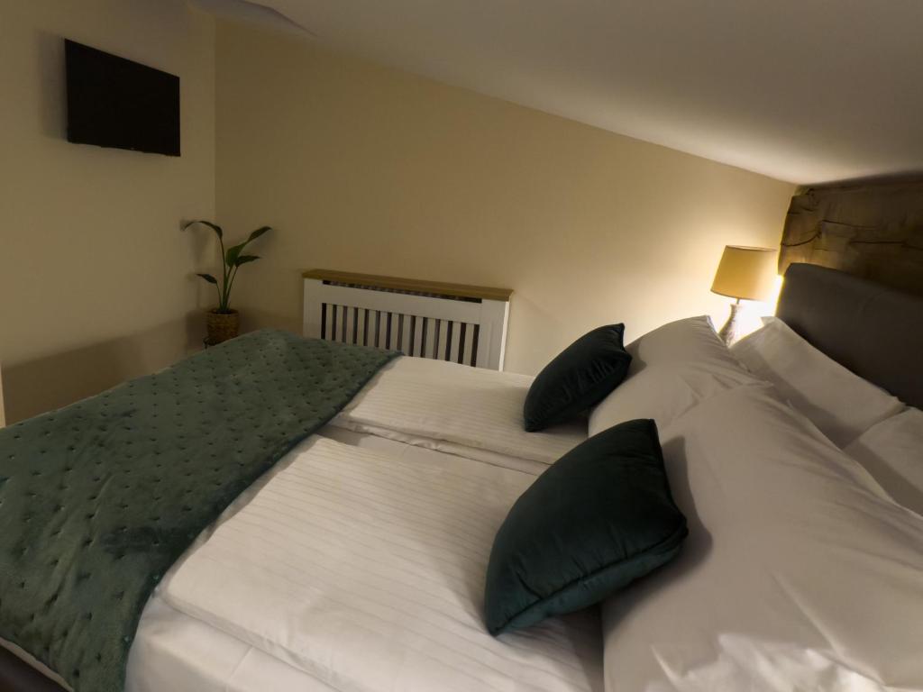 Postel nebo postele na pokoji v ubytování Il Cervo Chambres d'hôtes