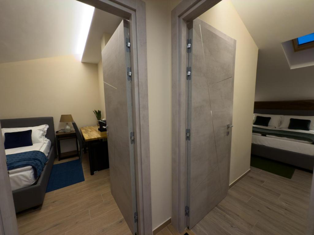 Postel nebo postele na pokoji v ubytování Il Cervo Chambres d'hôtes