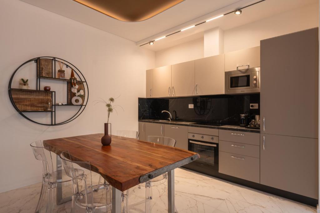 Kuchyň nebo kuchyňský kout v ubytování Apartament Exclusive,vicino metro Bengasi Torino