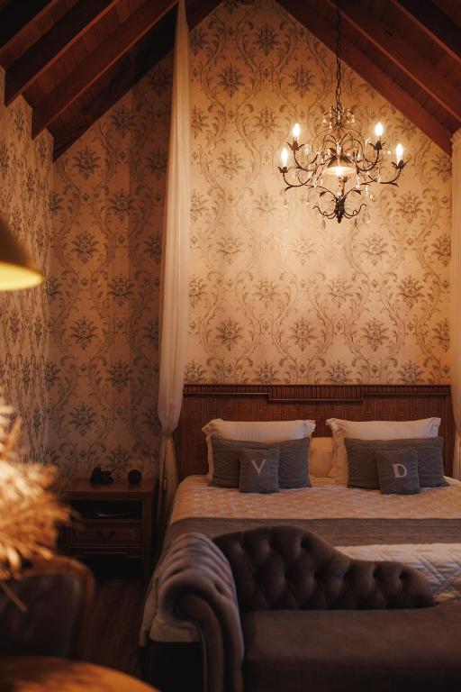 Postel nebo postele na pokoji v ubytování Hotel Valle Dincanto