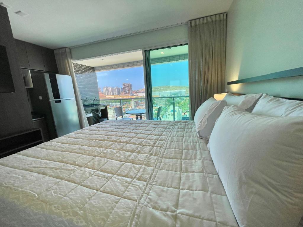 En eller flere senge i et værelse på RN Studio Premium 1006 Vista Mar