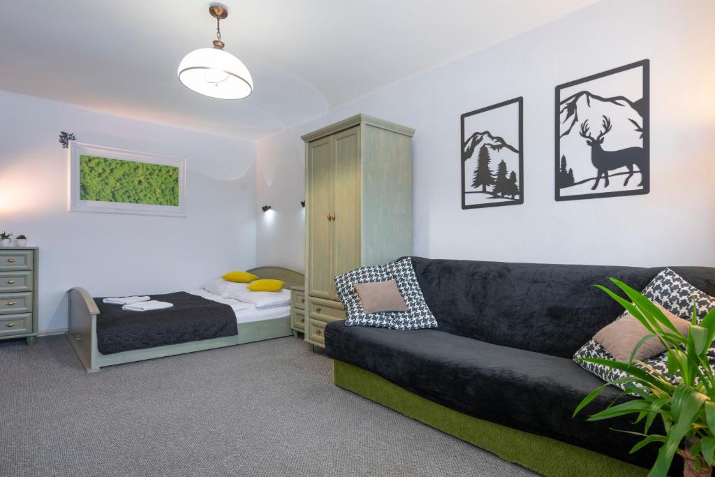Posedenie v ubytovaní APARTAMENT NAD KAMIEŃCZYKIEM IV