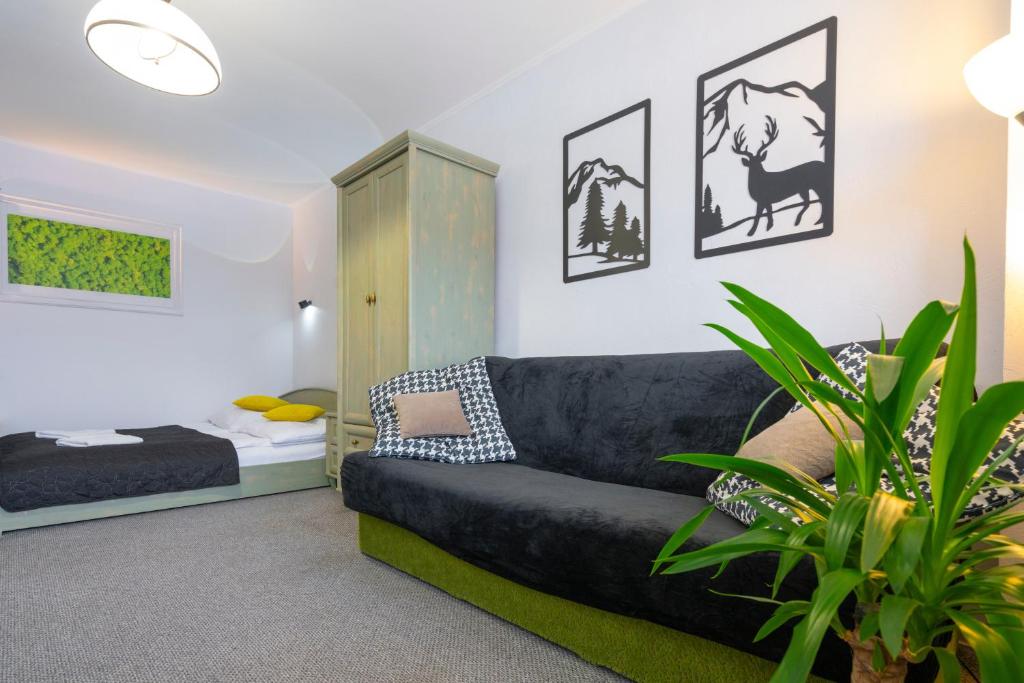 Posedenie v ubytovaní APARTAMENT NAD KAMIEŃCZYKIEM IV