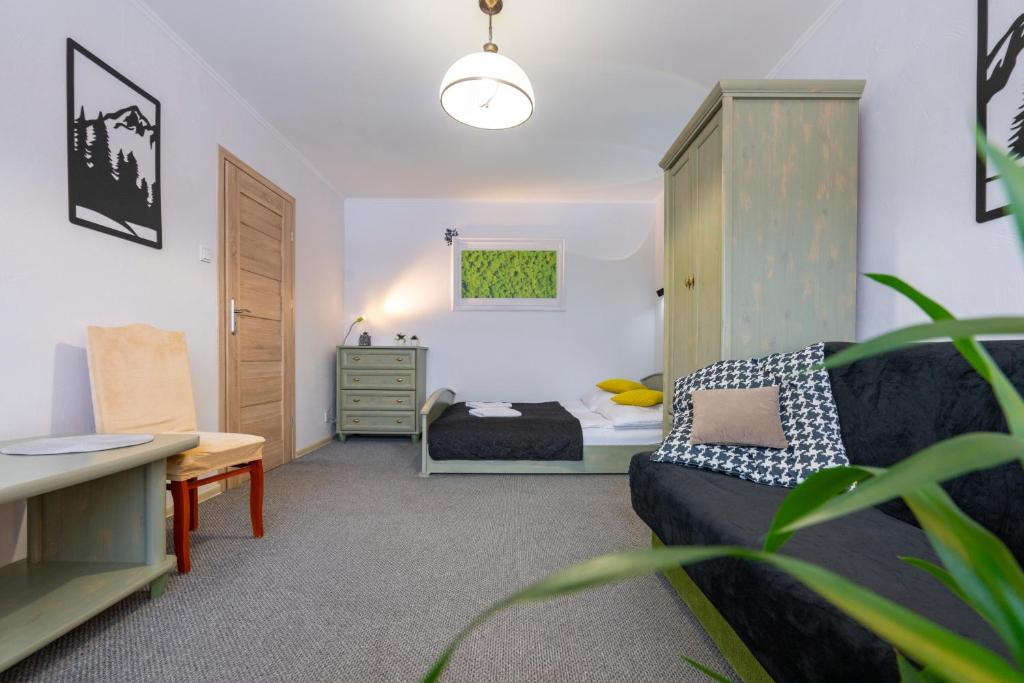 Posedenie v ubytovaní APARTAMENT NAD KAMIEŃCZYKIEM IV