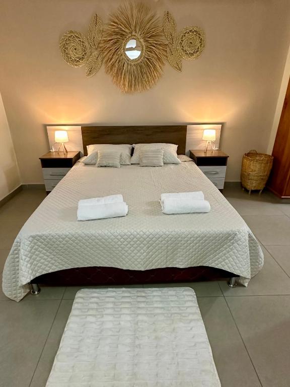 Postel nebo postele na pokoji v ubytování Apartamento con piscina, terraza y parking en las cercanías de Asunción